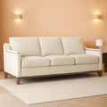 Beige ThreeSeater Upholstered Sofa With Nailhead Trim